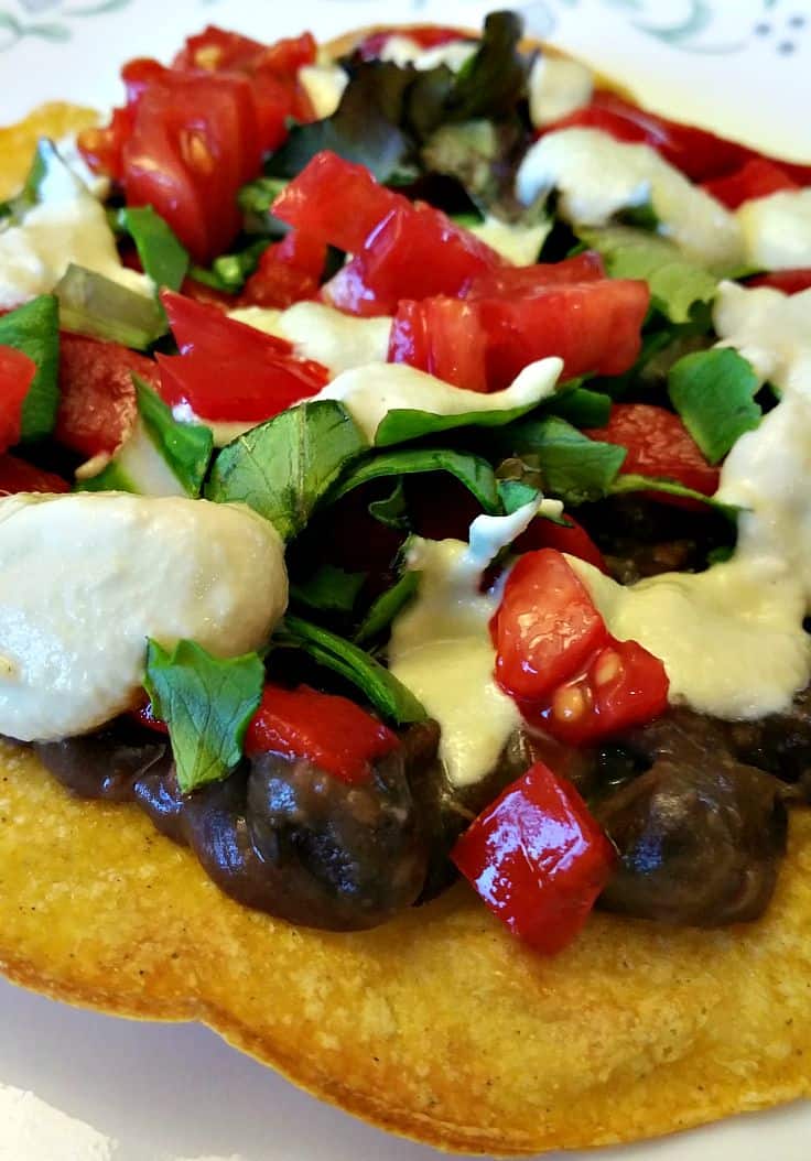 https://www.brandnewvegan.com/wp-content/uploads/2015/09/black-bean-tostadas-2.jpg