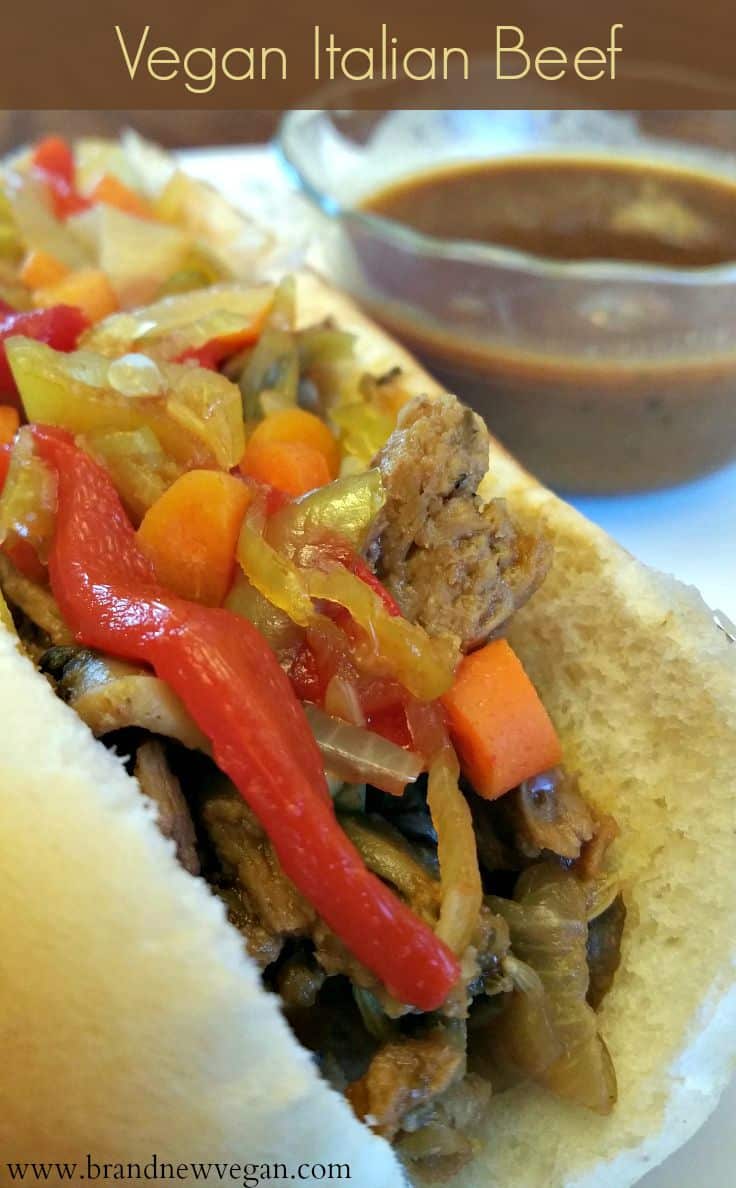 A Vegan Italian Beef Sandwich perfect for dipping. Marinated Soy Curls cooked in a homemade Italian 'beef' broth, and topped with homemade Giardiniera.