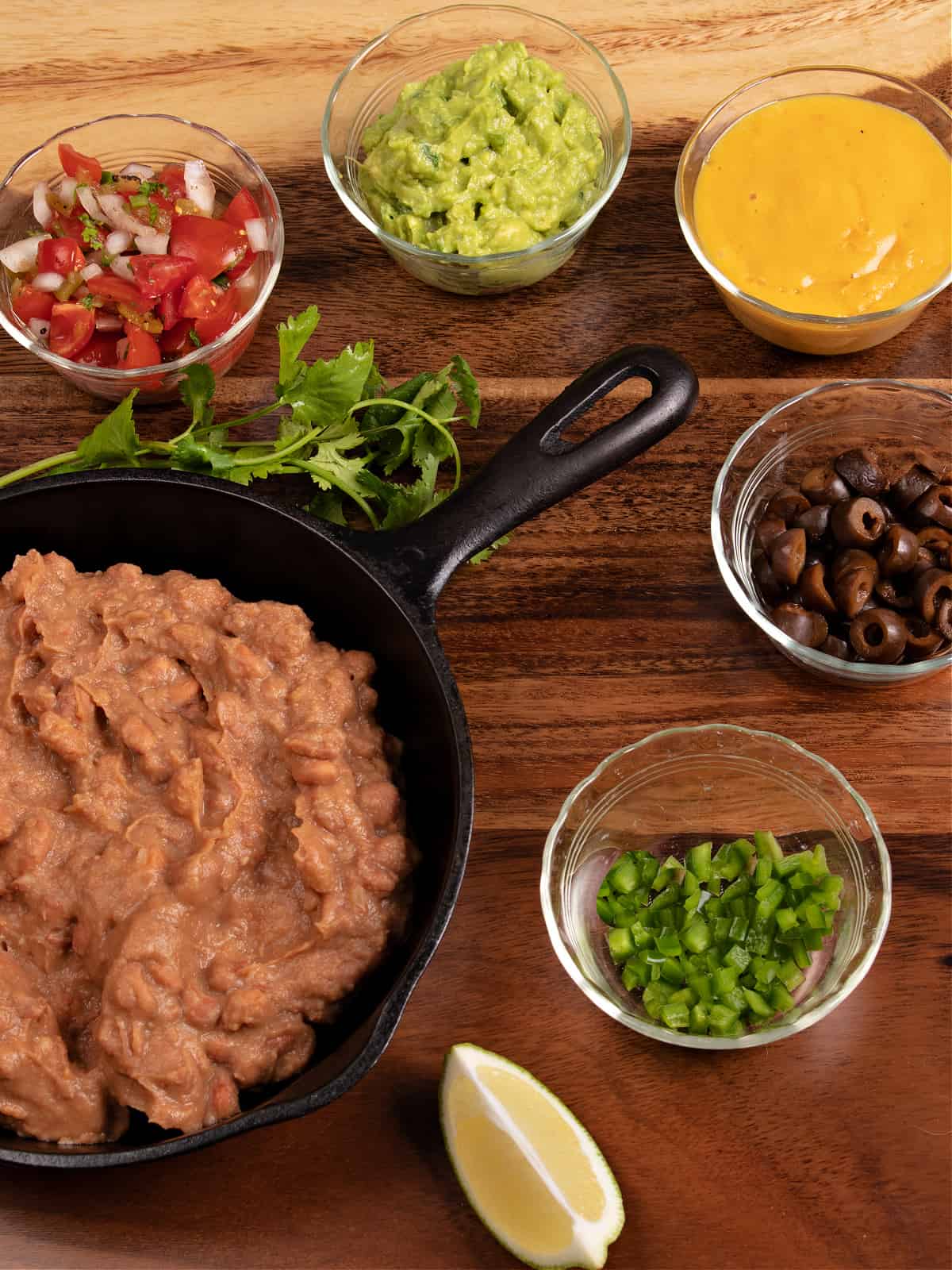 top down photo of all my vegan 7 layer dip ingredients