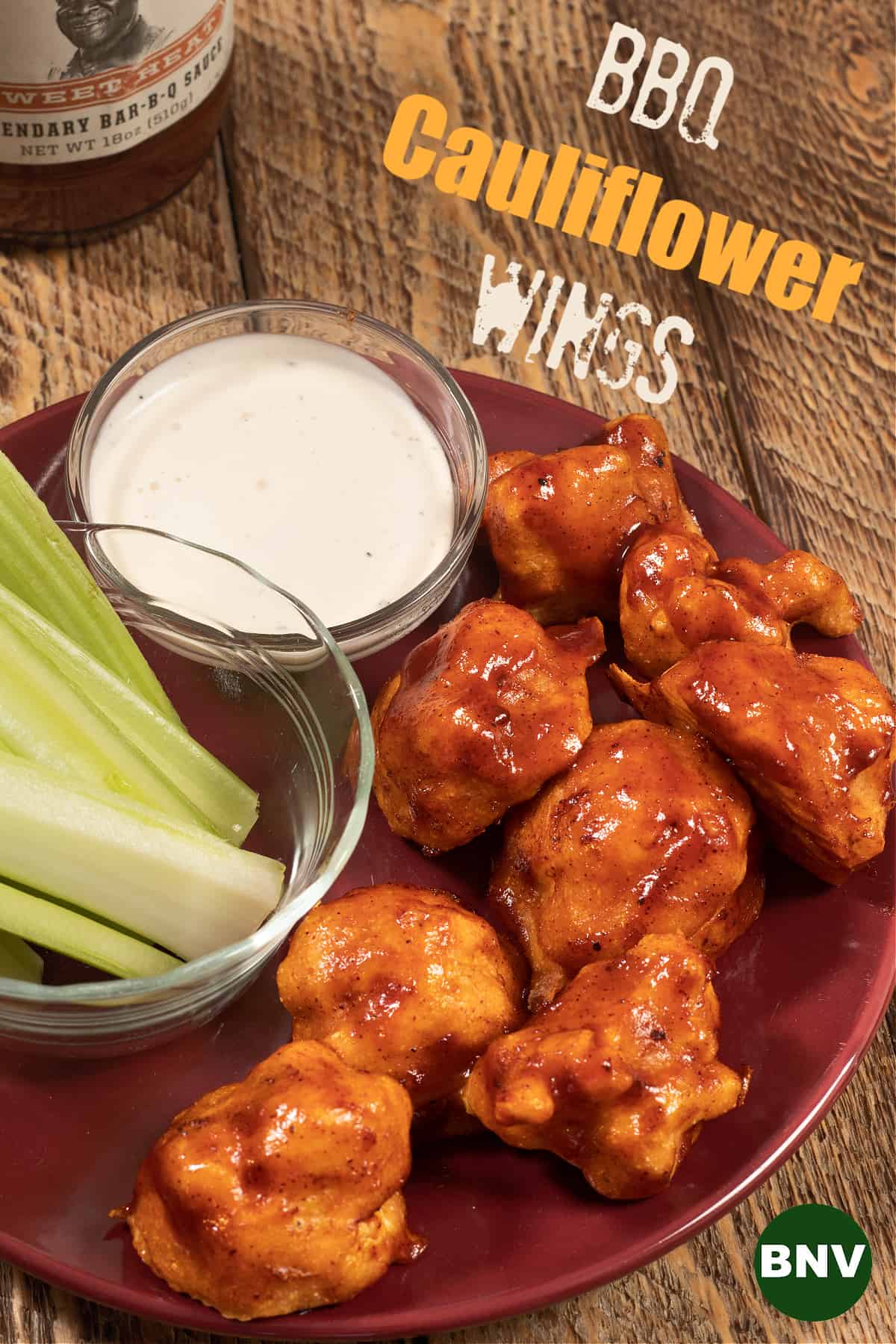 bbq cauliflower wings with a side of vegan ranch dressing and celery