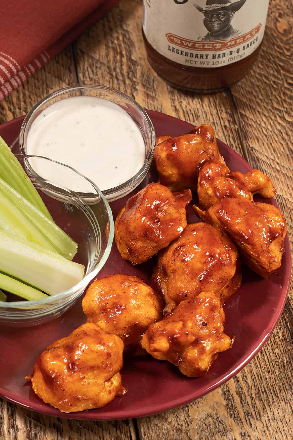 bbq cauliflower wings with a side of celery and vegan ranch