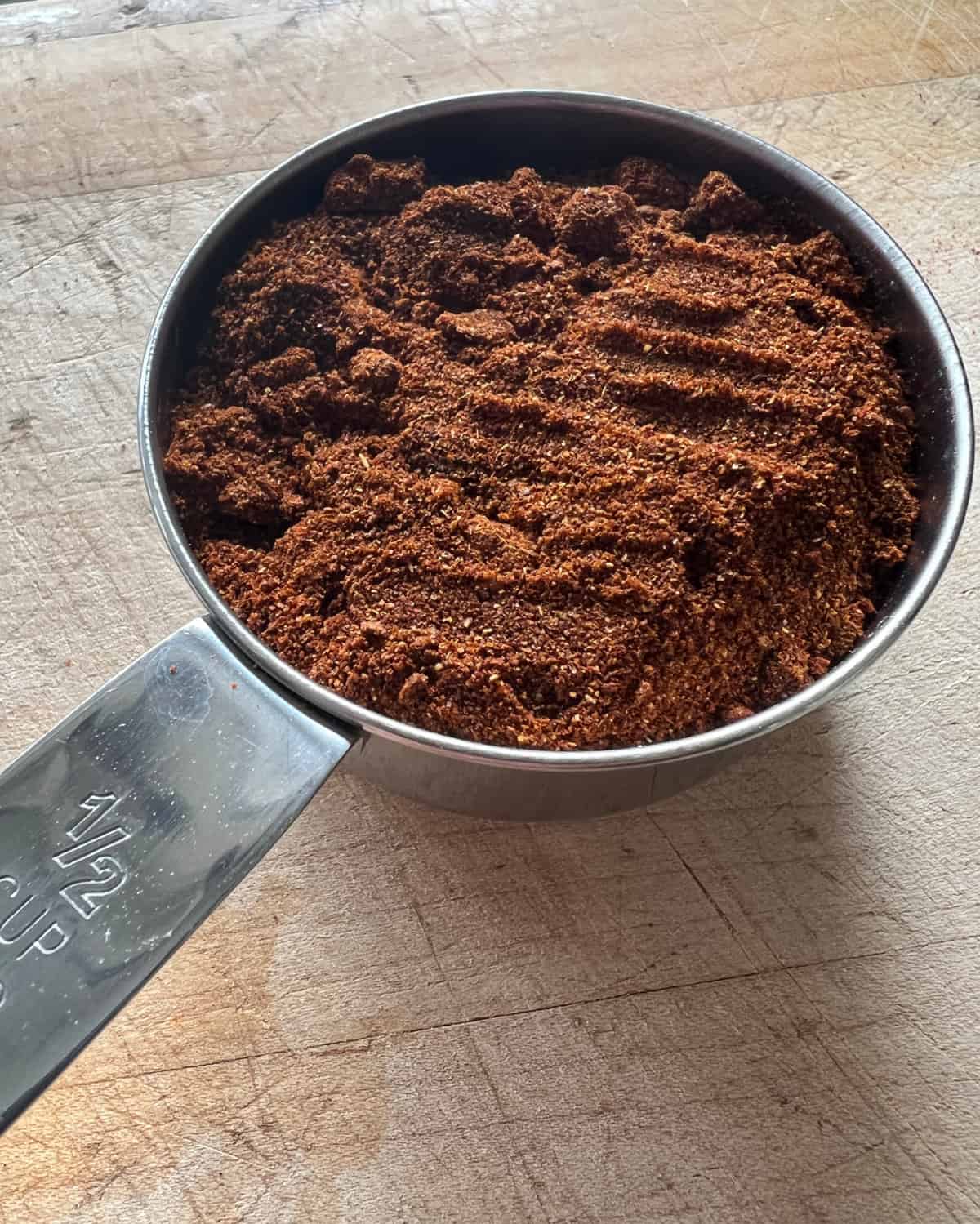 ½ cup measuring cup of ancho Chile powder