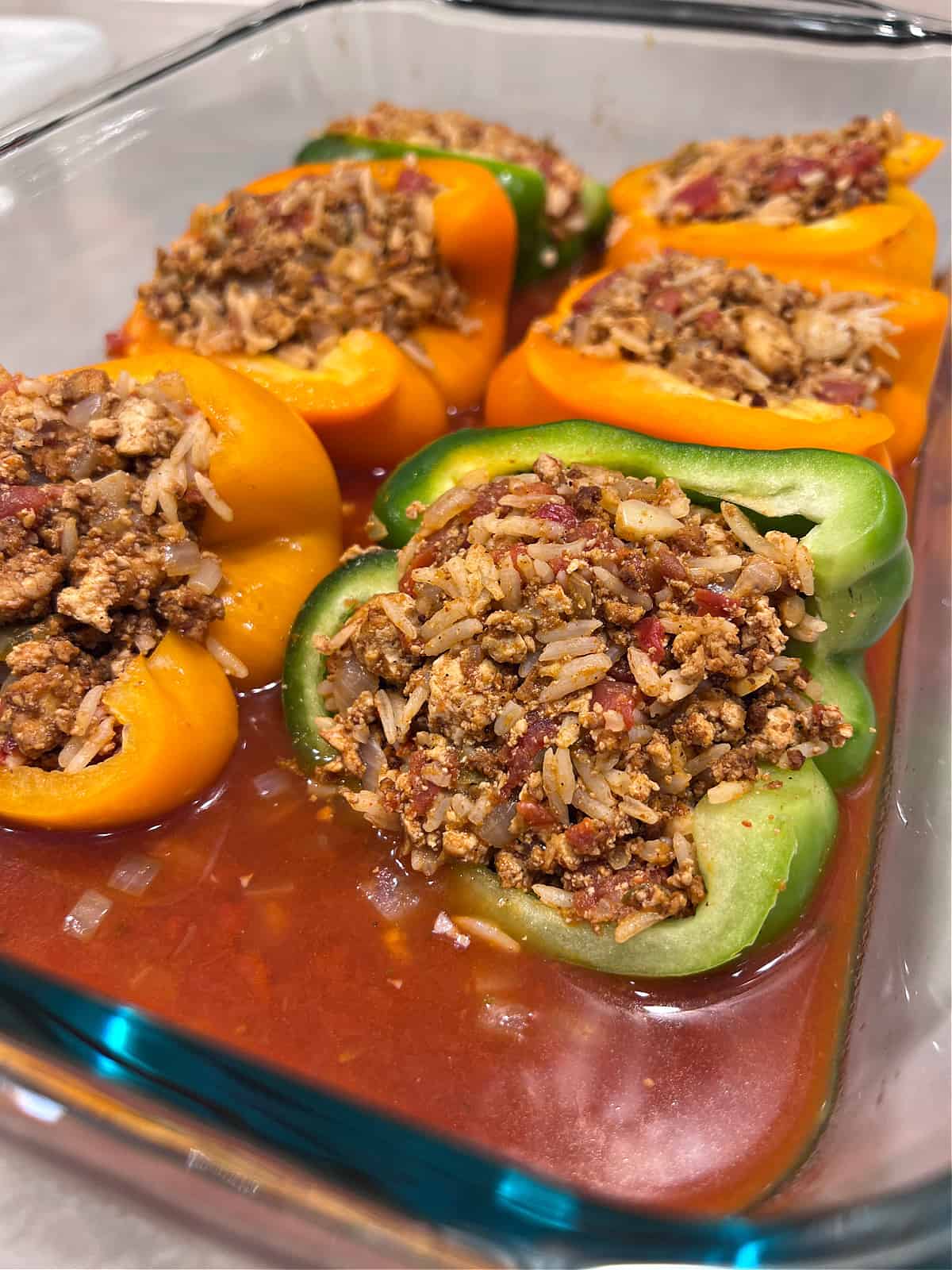 vegan stuffed bell peppers, ready for the oven