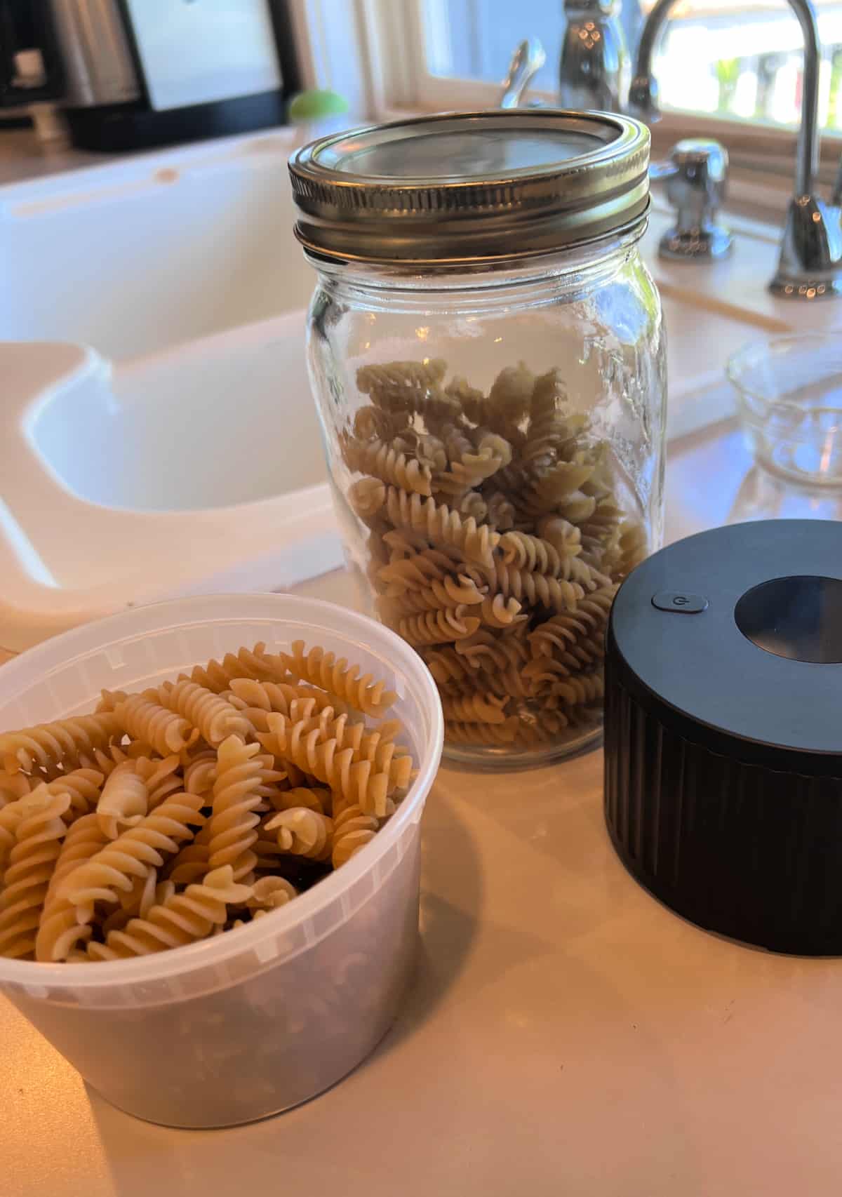 containers of brown rice fusilli pasta