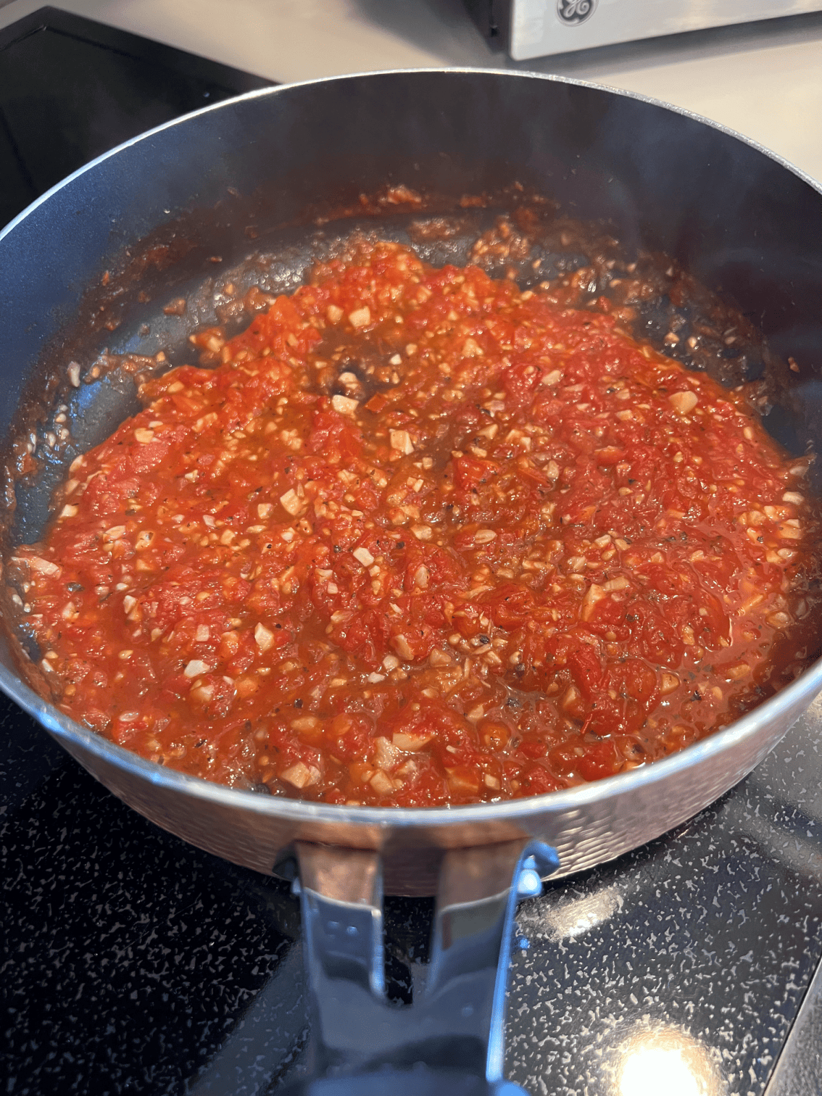 homemade tomato sauce with grated Campari Tomatoes and garlic