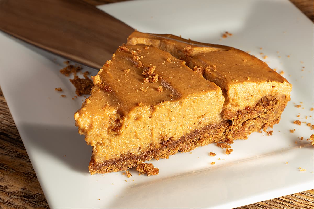 a slice of vegan pumpkin chiffon pie on a serving knife