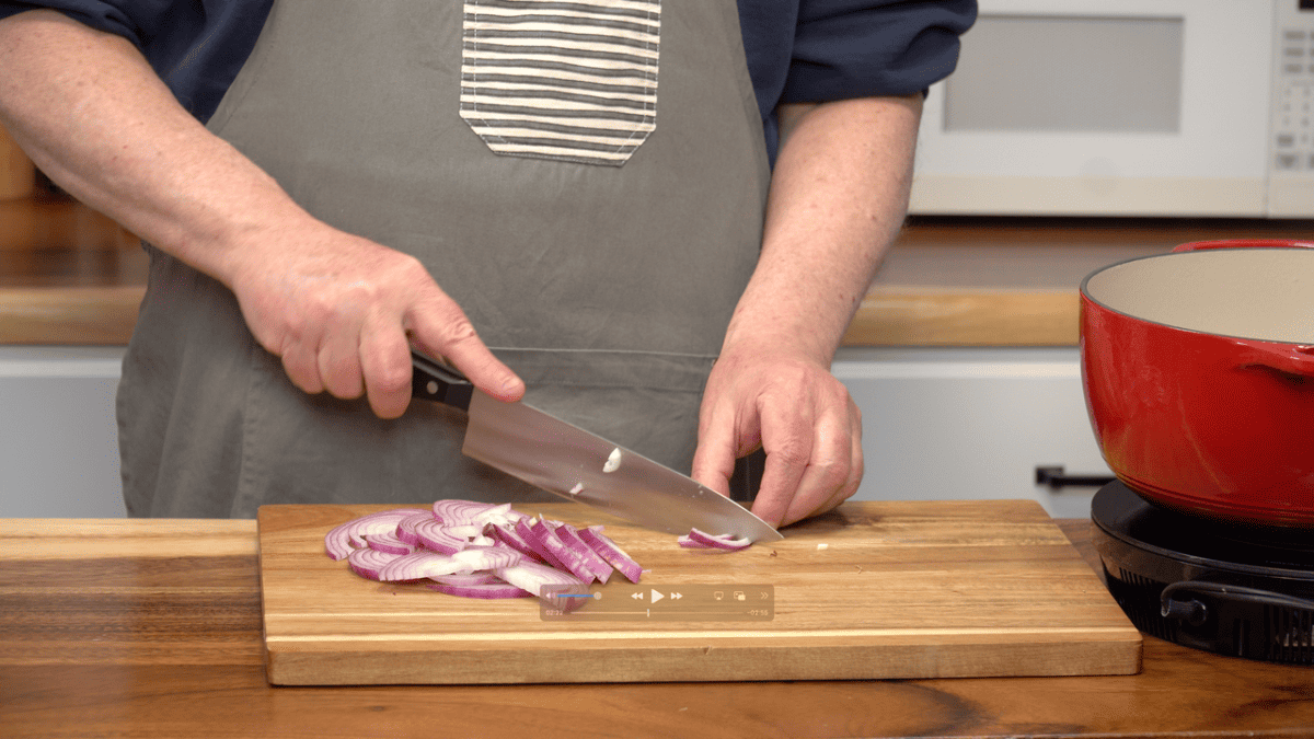 slicing red onions for braised red cabbage recipe