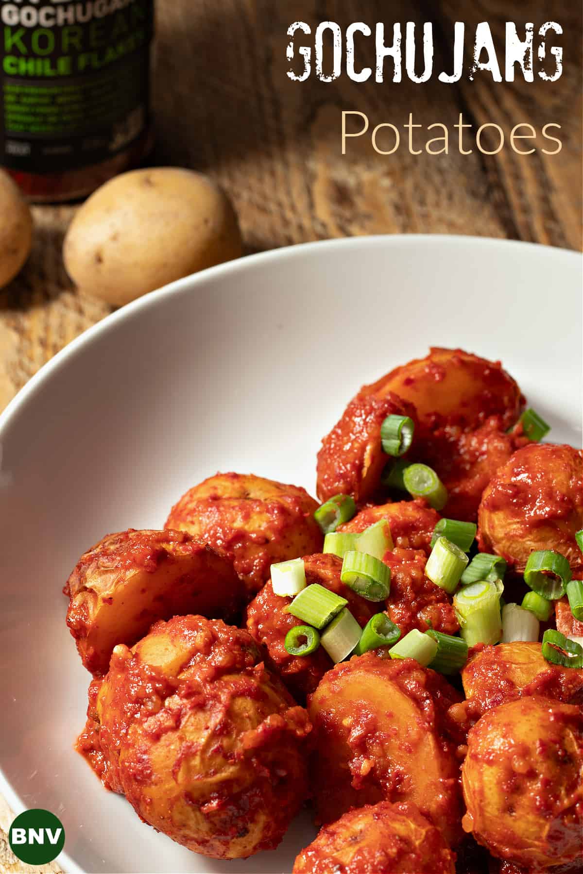 bowl of baby potatoes covered in gochujang