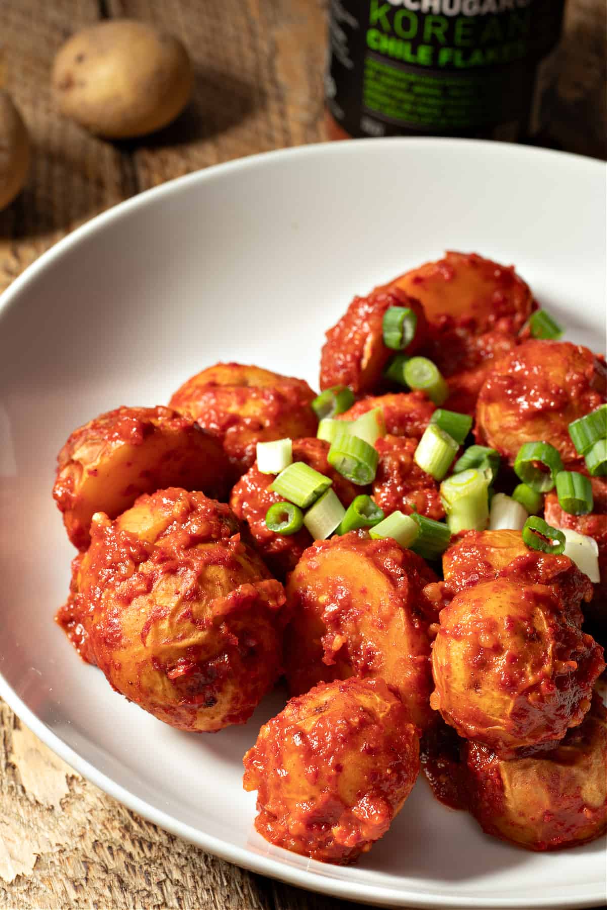 bowl of baby potatoes with gochujang sauce