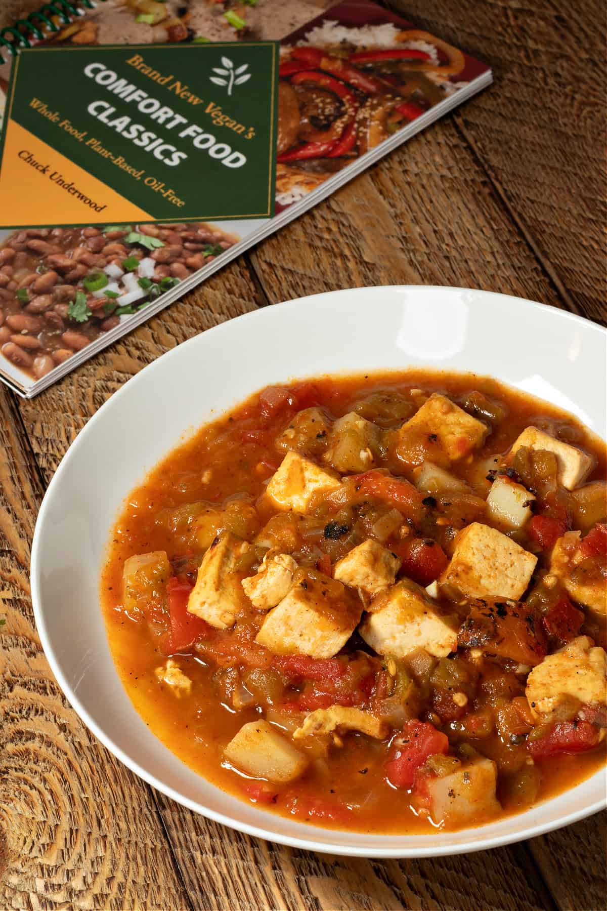 green Chile tofu stew with my new cookbook in the background