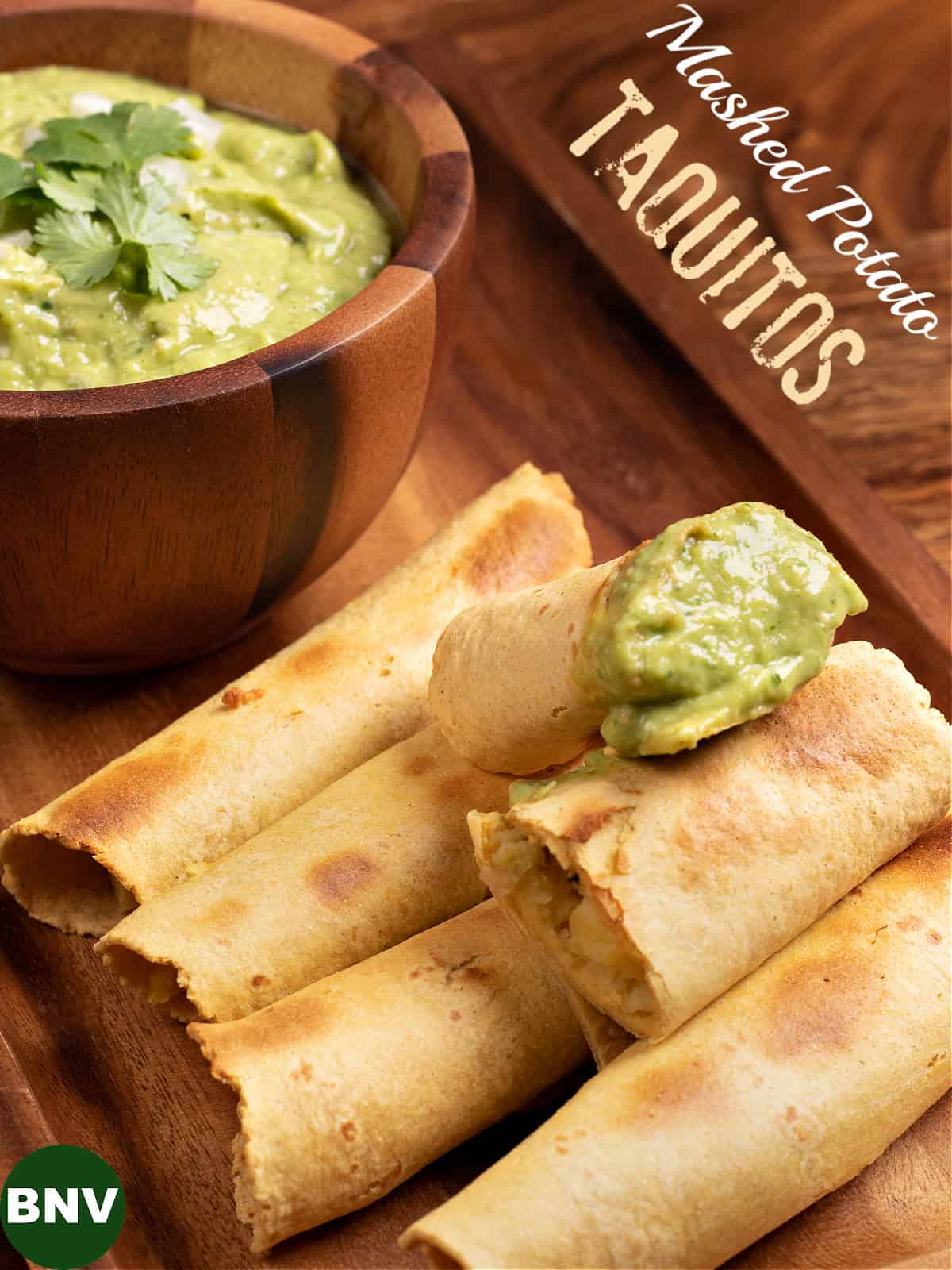 Stack of my mashed potato taquitos with a bowl of tomatillo avocado salsa