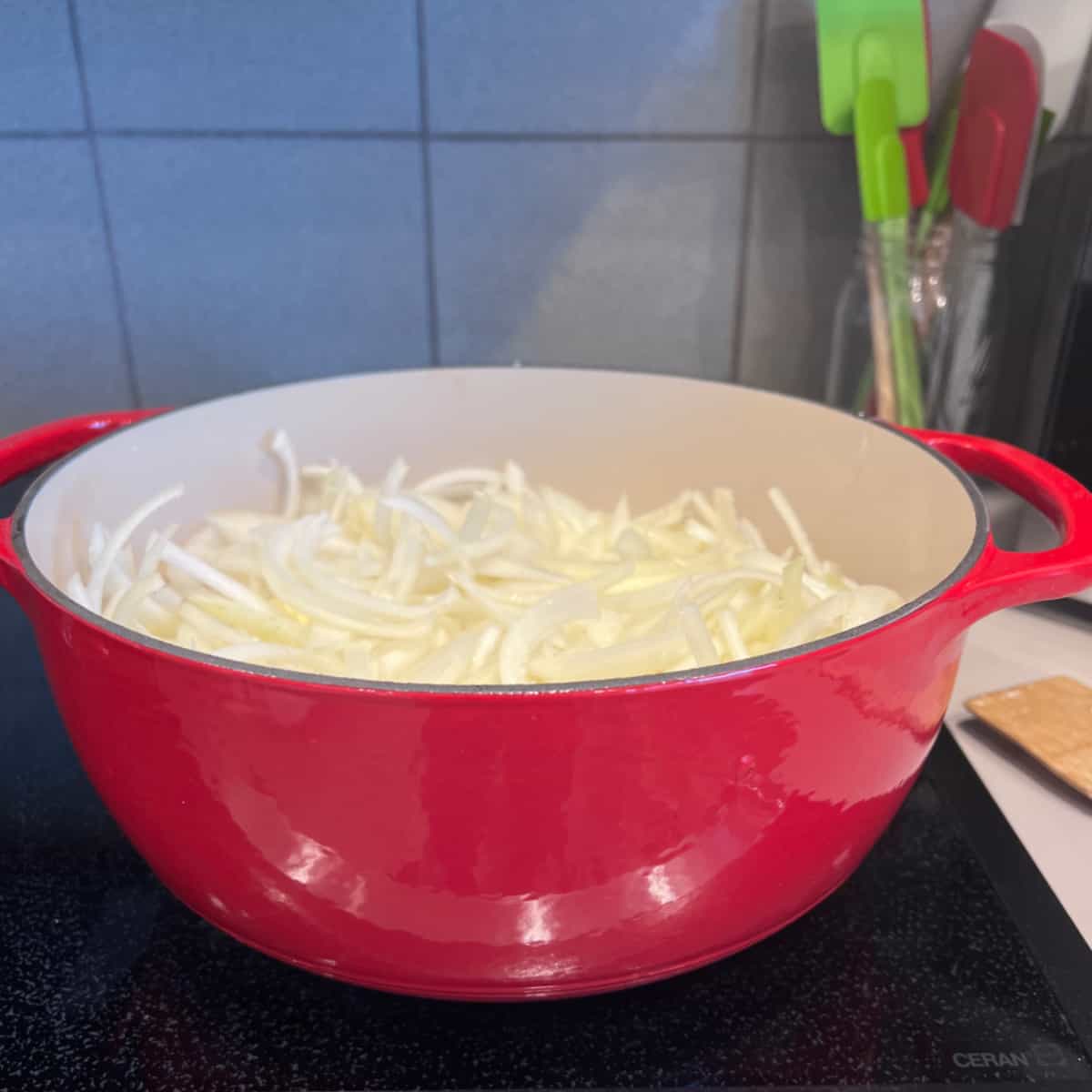 dutch oven filled with onions