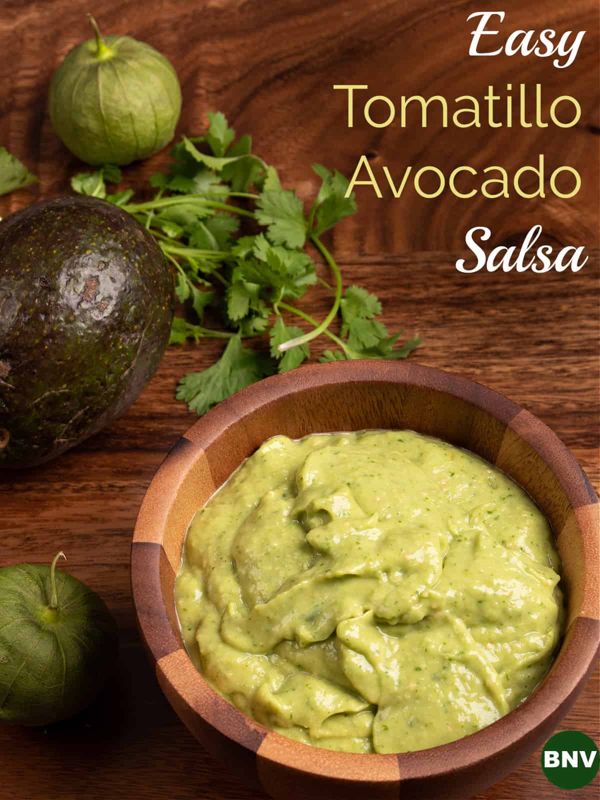 My tomatillo avocado salsa in a wooden bowl