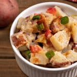 horizontal photo of a bowl of vegan potato salad