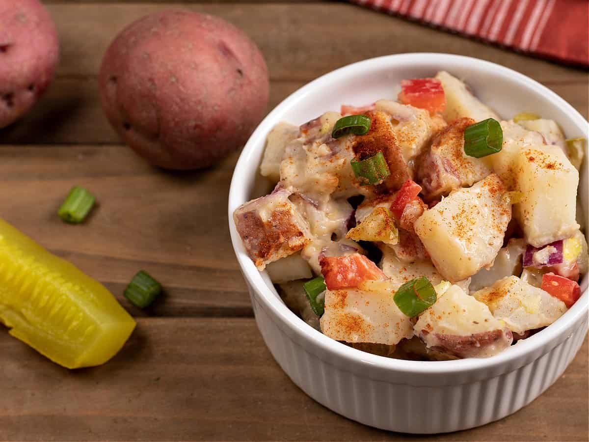 a bowl filled with vegan potato salad